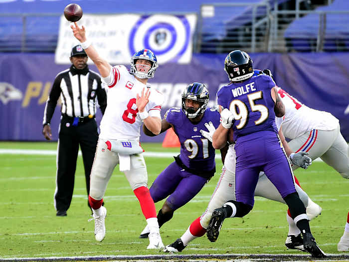 Dec 27, 2020; Baltimore, Maryland, USA; New York Giants quarterback Daniel Jones (8) throws a pass in the third quarter against the Baltimore Ravens at M&T Bank Stadium.